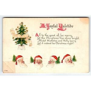 Antique "A Joyful Yuletide" Christmas Tree Santa Faces Postcard Mailed USA
